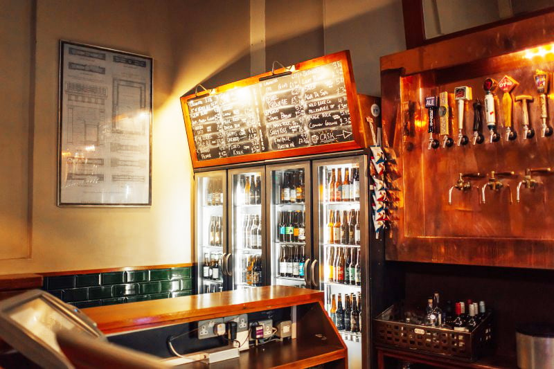 The Euston Tap fridge and tap handles